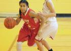 Groesbeck Lady Goat Alexis Burns (3) makes a move along the base-line to slip by a Diboll defender during their pool play game in the Fairfield Invitational Basketball Tournament last weekend. Photo by Stephen R. Farris/Sports Editor Article Image Alt Text