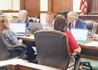 Road and Bridge Administrator James Trantham speaks to County Judge Richard Duncan and three of the four commissioners about the Lake Limestone Park 3 boat ramp guidance posts and pipes that are now underwater or missing after the substantial spring rains. Article Image Alt Text