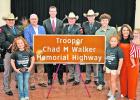 (in no particular order) Major Ruben Galindo; Texas State Rep. Kyle Kacal; Central Texas Regional director, Todd Snyder; Deputy Director, Freeman Martin; Texas DPS Director, Steven McCraw; and the family of the late Trooper Chad Walker; his wife, Tobie; son, Ethan; twin daughters, Rylee and Charlee; and Tulsa June with the newly dedicated Highway Memorial sign in honor of Trooper Walker on Tuesday, Nov. 8.