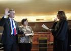 77th District Court Judge Roy DeFriend is sworn into office by 87th District Court Judge Amy Ward as his wife, Bonnie DeFriend, holds the Bible Friday, Jan. 3. Photos by Racheal Clark/Groesbeck Journal Article Image Alt Text