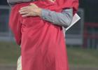 Ag Teacher and FFA Sponsor Kevin Devrow shares a moment with his favorite graduate of the Class of 2025, his son Trevor. Racheal Clark Photos/ Groesbeck Journal Article Image Alt Text