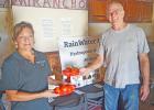 Kenda Echols and Don Stevens are pictured with some of the hydroponic tomatoes which were grown at Rainwater Farms in Kosse. Journal photo/Tom Hawkins