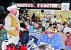Limestone County Sheriff Dennis Wilson, of Groesbeck, scans the crowd for bidders at the Duck’s Unlimited Banquet, held Saturday, Feb. 3, at the Cowboy Club, in Mexia. Proceeds of the annual fundraiser go to protect duck habitat across Texas. Photos by Roxanne Thompson/The Groesbeck Journal