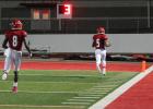 Ameer Lee (5) crosses the goal line with an escort from Nick Mosley (8) at the end of an 85-yard punt return in a 50-0 homecoming win over Palestine Westwood last Friday. Photo by Todd Boyd/Special to The Groesbeck Journal