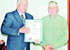 Limestone County Judge Richard Duncan, left, presents a First Families certificate to Gene Alston, who established through genealogical research that he had at least 12 ancestors who lived in Limestone County.... Photo by Roxanne Thompson/Groesbeck Journal