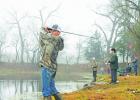 Kosse resident Cayden Wilson casts his fishing rod into Lake Springfield at the Fort Parker State Park Kid Fish event Jan. 28. 