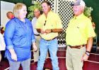 Limestone County Sheriff Dennis Wilson, right, socializes with State Rep. Kyle Kacel’s Chief of Staff Terra Willett and husband Jud at last year’s Mexia State Supported Living Center Volunteer Council gala fundraiser. This year’s gala is set for next Saturday, Aug. 18, at the Christian Life Center of First Baptist Church, Mexia, with gates opening at 5:30 and dinner beginning at 6. Tickets are $25 and are available from any Volunteer Council member or at the door. Mexia News file photo