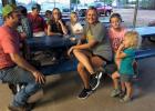 Getting ready for the movie this past Saturday night. We watched Rango. Next movie night is August 25. Thank you Walter and Melissa for setting up your equipment Article Image Alt Text