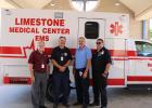 Larry Price, Limestone Medical Center chief executive officer, joins paramedic Wade Kaminski, Emergency Medical Services Director Shelton Chapman, and paramedic Jerald Hahn in front of their new ambulance. Photo by Racheal Clark/Groesbeck Journal Article Image Alt Text