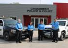 Terry Beekman, Jamie Bay, Mary Foster, and Alan Davis pose for a photo with their citizen patrol cars in front of the police station Monday morning, April 8. Photo by Racheal Clark/Groesbeck Journal Article Image Alt Text