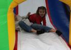 Local kids have a blast on the inflatable slide at the city holiday celebration on Saturday, Dec. 2. Article Image Alt Text