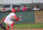 Nick Sanchez squares to bunt the ball in the first inning of a game against Mexia at Groesbeck on Saturday, March 23. Sanchez drove in the go-ahead run in the sixth inning and pitched the seventh inning to earn a save in a 5-4 Goats victory. Photo by Skip Leon/The Groesbeck Journal Article Image Alt Text