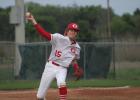 Groesbeck pitcher Braydan Urban throws to first base attempting to pick off a Mexia runner in the fifth inning of a game at Groesbeck on Saturday, March 23. Urban doubled to ignite a four-run rally in the sixth inning that propelled the Goats to a 5-4 victory. Photo by Skip Leon/The Groesbeck Journal Article Image Alt Text