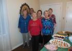 In the picture are the hostesses for the evening...Mary Belle Leach, Sue Waller, Angie Roach, Annette Brannan, Martha Stone, and Suzie Waller. Article Image Alt Text