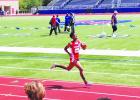 : Randy Canady of Groesbeck led the field the first two laps of the boys 3A 3200 meter run. He ultimately came in fourth with a time of 10:29.16. William Blees III photo