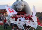 Groesbeck athletic director and head football coach Steven Hale leads his team onto the field last Friday for the Goats home opener of the 2017 season. Groesbeck pulled off a fourth-quarter comeback for the 24-21 win and a 2-0 start to the year. Next up is the Battle of the River against Mexia. Photo by Todd Boyd/Special to the Journal
